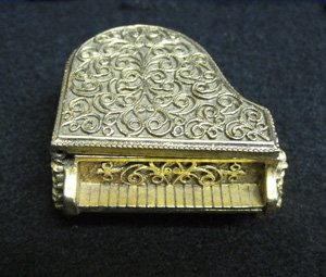 Replica of a Piano Pewter with gold plating antique finish